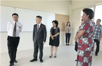  ?? Photo: Ashna Kumar ?? Chinese Ambassador to Fiji Qian Bo (second from left) with wife Lu Qi visited one of the classrooms during the opening of Yat Sen Secondary School’s new wing at the school in Suva on April 12, 2018.