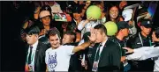  ?? PROVIDED TO CHINA DAILY ?? Roger Federer waves to fans at last year’s Shanghai Masters. The Swiss legend will hit shots with youngsters on Saturday at Qizhong Tennis Center.