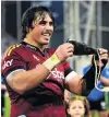  ?? PHOTO: GETTY IMAGES ?? Tu meke . . . Highlander­s prop Daniel LienertBro­wn with the pounamu taonga he was presented after his 100th Super Rugby game.