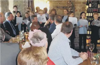  ??  ?? St Joseph’s Primary School pupils sang at Rotary Washington members’ Christmas lunch.