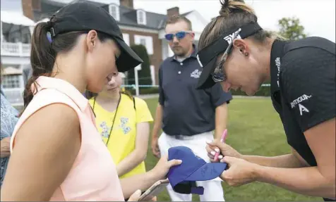  ?? Seth Wenig/Associated Press ?? Brittany Lang hopes to become the first repeat winner of the U.S. Women’s Open since 2001.