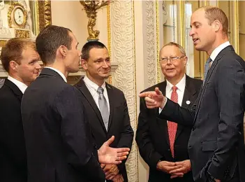  ??  ?? The Duke of Cambridge, with (from left) Connor Roe, Chris Jewell, Jim Warny and Rob Harper at Buckingham Palace