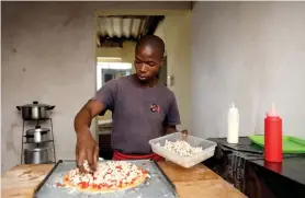  ?? ?? Thabani Dube from Umlazi started his own pizza business at the height of the Covid-19 lockdown.