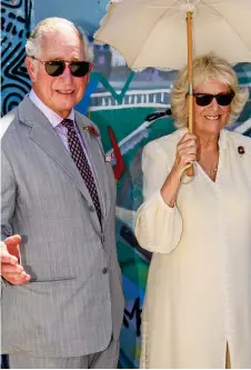  ??  ?? Exotic: Charles and Camilla on a visit to Ghana