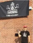  ??  ?? “You get to know a person better for sure when you throw some axes with them,” Julian Rutkowski, manager of Bad Axe Throwing, said.