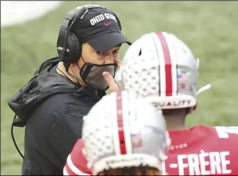  ?? John Kuntz/ Cleveland.com ?? Ohio State Buckeyes head coach Ryan Day talks with a player in the fourth quarter, November 21, 2020, at Ohio Stadium in Columbus.