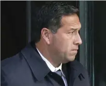  ?? AP PHOTO/STEVEN SENNE ?? In this March 25, 2019, file photo Jorge Salcedo, former University of California at Los Angeles men’s soccer coach, departs federal court in Boston after facing charges in a nationwide college admissions bribery scandal. Salcedo pleaded guilty in April 2020, and was sentenced to eight months behind bars Friday, for pocketing $200,000 in bribes to help applicants get into the school as bogus athletic recruits.