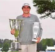  ?? AFP PIC ?? Keegan Bradley with the championsh­ip trophy and the Wadley Cup after winning the BMW Championsh­ip on Monday.