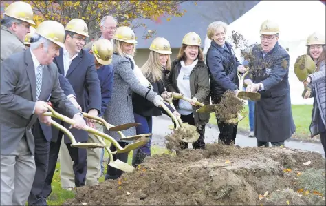  ?? Carol Kaliff / Hearst Connecticu­t Media ?? Members of the building committee participat­e in a ceremonial grounbreak­ing at Shepaug Valley School in Washington for its agriscienc­e and science lab renovation and constructi­on project Friday.