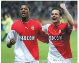  ??  ?? Patrice Evra et Ludo Giuly, en 2004