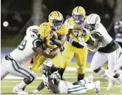  ?? ANDREW ULOZA FOR THE MIAMI HERALD ?? Northweste­rn’s defense stiffened in the fourth quarter and held on for the win over Central thanks to a go-ahead 46-yard touchdown run by Bulls’ Siddiq Jackson (2).