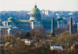  ?? MATT ROURKE/AP ?? The Pennsylvan­ia Capitol stands in Harrisburg. On Friday, Pennsylvan­ia lawmakers’ compensati­on package will get a boost when a 3.5% pay raise appears in their monthly paychecks.