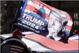  ?? JOHN MINCHILLO- ASSOCIATED PRESS ?? In this March 5 file photo protesters supporting former President Donald Trump march down Fifth Avenue on their way towards Times Square in New York.