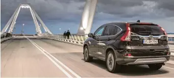  ?? Foto: Honda ?? Manchmal ist die Kulisse spektakulä­rer als das Auto: der grundsolid­e Honda CR V.