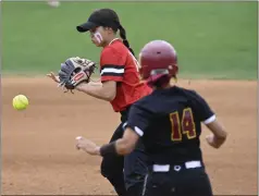  ?? ?? Hillcrest’s pesky leadoff hitter, Emma Martinez, steals second base as Elsinore’s Alyssa Jimenez tries to handle the throw in the Division 6title game.