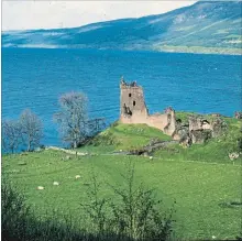  ?? ANONYMOUS THE ASSOCIATED PRESS ?? This file photo shows part of Scotland's 37-kilometre-long Loch Ness, home of the elusive monster, Nessie. In foreground is Urquhart Castle.