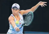  ??  ?? Top-ranked Ashleigh Barty beat American Shelby Rogers 6-3, 6-4 to reach the quarter-finals without dropping a set.