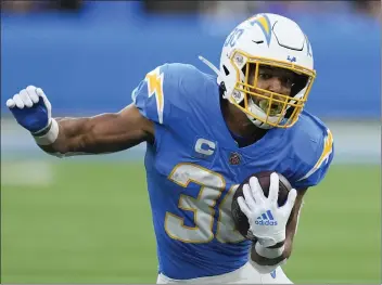  ?? MARK J. TERRILL — THE ASSOCIATED PRESS FILE ?? Los Angeles Chargers running back Austin Ekeler could be on his way out. Ekeler's agent said that the team has given Ekeler permission to seek a trade after both sides could not agree on a contract extension.