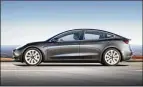  ?? TESLA ?? The Tesla 3 midmarket electric car, which launched last month, is outfitted only with a touchscree­n on its dashboard. Other add-ons include self-driving software and a higher-quality sound system.