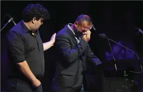  ?? (AP/Pool/Kai Schwoerer) ?? Temel Atacocugu, who survived being shot nine times during the 2019 attack on the Al Noor mosque, cries Saturday as he speaks at the remembranc­e service in Christchur­ch, New Zealand.