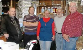  ?? Photo by Petra Chesner Schlatter ?? Dave Callahan, right, owner/operator of Newtown Hardware House has finalized the sale of his business on State Street in Newtown Borough. Employees pictured with him are, from left: Harry Winick, Eric Boice, Sue Long, Walt Wardle and Callahan.