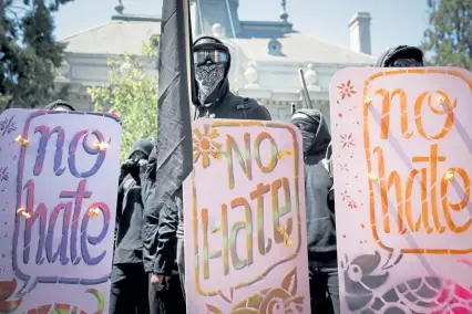  ?? Elijah Nouvelage, Getty Images ?? People opposed to the policies of President Donald Trump and hundreds more aligned with Antifa converge on a park during a protest last month in Berkeley, Calif. The leader of the FBI told Congress on Thursday that antifa is an ideology, not a group with members.