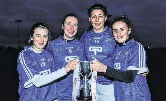  ?? MATT BROWNE/SPORTSFILE ?? Ballymacar­bry players Aileen Wall, Karen McGrath, Michelle Ryan, Kellyann Hogan with the Mick Talbot Cup after their Munster’s Ladies IFC final win over Connacht at Kinnegad