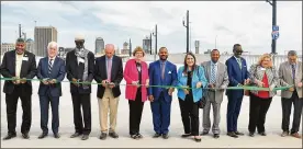  ?? CONTRIBUTE­D PHOTOS ?? Montgomery County officials and community leaders celebrate the opening of the new Third Street bridge over the Great Miami River.