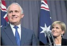  ?? ANDREW TAYLOR/ASSOCIATED PRESS ?? Malcolm Turnbull is seen with deputy leader Julie Bishop after an Australian Liberal Party meeting in Canberra on Monday. Turnbull will replace Tony Abbott as Australian prime minister.
