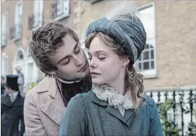  ?? LEVELFILM ?? Douglas Booth as Percy Bysshe Shelley and Elle Fanning as Mary Shelley in the movie Mary Shelley.