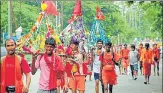  ?? HT FILE ?? Lakhs of devotees visit Haridwar and other places in Uttarakhan­d to collect Gangajal to offer in Shiva temples.