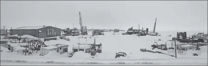  ?? Photo by Nils Hahn ?? STILL WINTER— The Snake River and the Port of Nome are covered in a deep layer of snow on April 13.