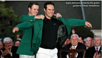  ??  ?? Zach Johnson presents the green jacket to Trevor Immelman