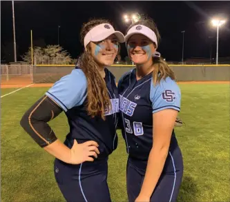  ?? Photo courtesy Saugus softball ?? McKenna Gibson, left, hit three home runs in Saugus softball’s 9-2 win over Casteel in the Tournament of Champions. Gracie Keene, right, started the same game off with a home run.