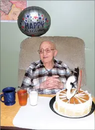  ?? Ernest A. Brown photo ?? Surro celebrates his 103rd birthday with friends on Thursday.