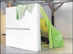  ?? PHOTOS CONTRIBUTE­D BY BRITTAINY LAUBACK ?? Meta Gary’s “Fort 5,” sheets, sofa, TV and video, is featured in the ATHICA exhibition “Domestic Structures” in Athens.