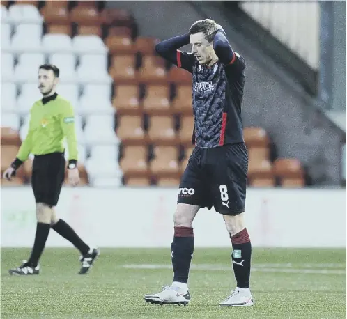  ??  ?? 0 Falkirk midfielder Blair Alston shows his frustratio­n after Airdrie’s second goal confirmed another season in League 1 for the Bairns