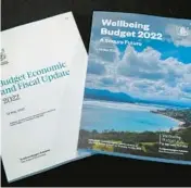  ?? MARK MITCHELL/NZ HERALD ?? New Zealand’s 2022 budget includes inflation payments of a few hundred dollars to more than 2 million lower-income adults beginning in August.