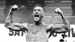  ?? JOHN GURZINSKI/AFP VIA GETTY ?? MMA fighter Conor McGregor, posing here during a weigh-in in Las Vegas in 2017, announced his retirement from the sport on Sunday.