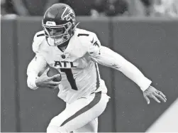  ?? DANIEL KUCIN JR./AP ?? Quarterbac­k Marcus Mariota, seen during a game against the Commanders on Nov. 27, was released by the Falcons on Tuesday.