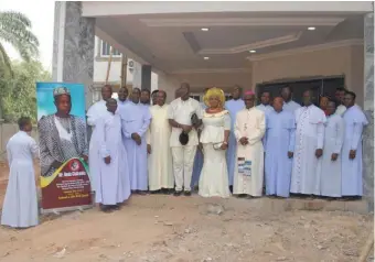  ??  ?? Dr. Obiorah Chukwuka, his wife, Oby (middle), flanked by Reverend Fathers at the 25th memorial service of late Pa Denis Chukwuka