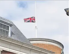  ??  ?? Flag flying at half-mast from the top of Fenwicks