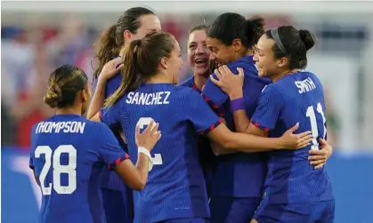  ?? Photograph: John Todd/USSF/Getty Images ?? Alana Cook (15) of the United States is hugged by her teammates after scoring against Ireland on Tuesday in St Louis, Missouri.