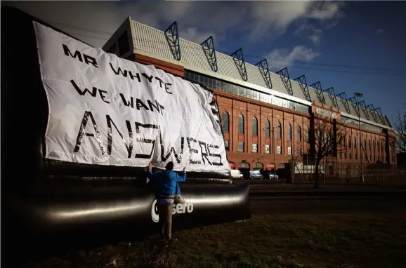  ??  ?? Right Mcculloch stayed put and became skipper Below Dark days at Ibrox in 2012