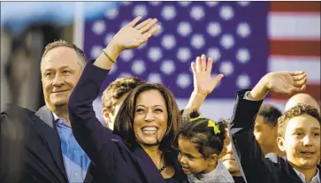  ?? Photograph­s by Marcus Yam Los Angeles Times ?? SEN. KAMALA HARRIS, center left, at an Oakland rally announcing her presidenti­al campaign on Jan. 27.