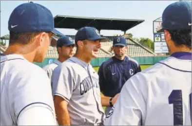  ?? Richard Shiro / ST ?? UConn coach Jim Penders talks with his team after a win over Sacred Heart in an NCAA regional game in 2011.