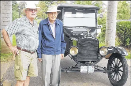  ?? SuBmIttED PHOtO ?? Two old friends were reunited again in Truro over the weekend: one being a 1923 Model T Ford Roadster, and the other, its restorer. Forty-one years ago, Don Sutherland and his son, Doug, seen here on the right, set about to restore a very significan­t...
