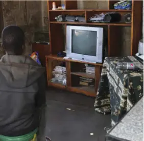  ?? ?? Frank Ndlovu sits in his grandmothe­r's house in Nkulumane, Bulawayo.