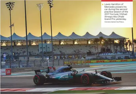  ?? Virendra Saklani/Gulf News ?? Lewis Hamilton of Mercedes powers his car during the second practice session of the 2017 Formula 1 Etihad Airways Abu Dhabi Grand Prix yesterday.