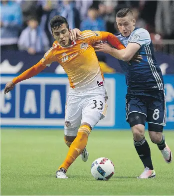  ?? GERRY KAHRMANN ?? Vancouver Whitecaps fullback Fraser Aird, right, played as a Glasgow Ranger against rival Celtic last season in the first ‘Old Firm’ match between the Scottish clubs in nearly three years.